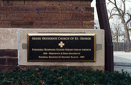 Bronze plaque affixed to cornerstone commemorating Elmwood Presbyterian and St. George churches, and the placement of the building on the National Register of Historic Places.